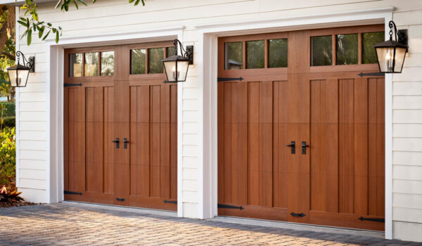 Canyon Ridge® Carriage House (5-Layer) Residential Garage Door Insulated carriage house garage doors with faux wood-look composite overlays.