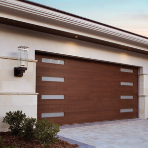Residential Canyon Ridge® Modern Insulated modern style garage doors with faux wood-look composite overlays.